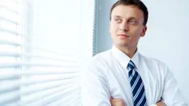 young-businessman-by-the-window